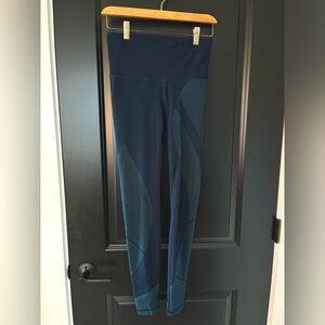 Lululemon Lab leggings. Very high waisted. I think they are size 4.